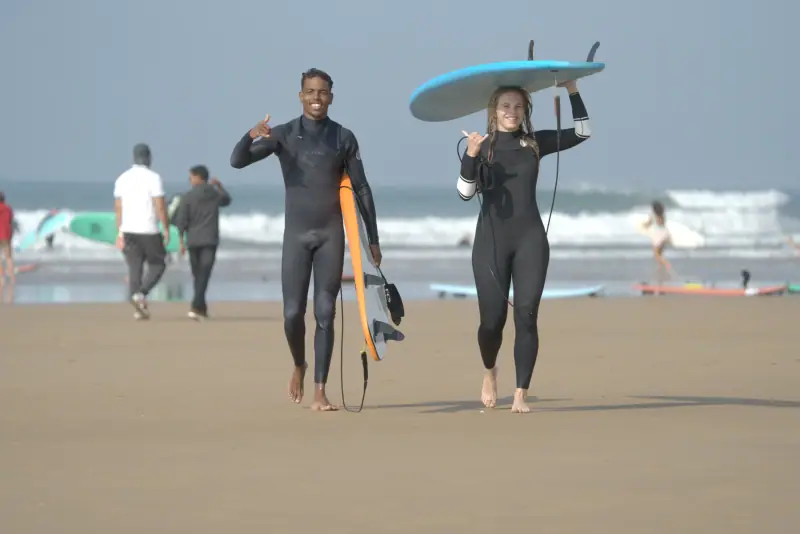 Guests and surf life at Waves Hunter Surf House, Anza